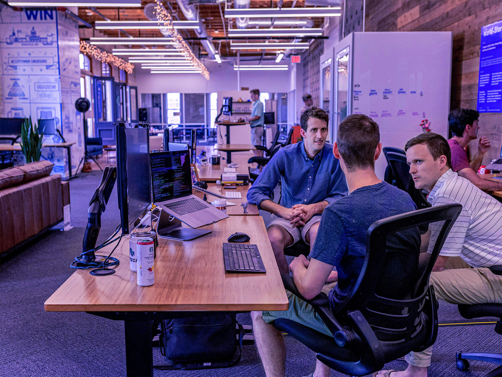 Team of developers having a discussion in an office